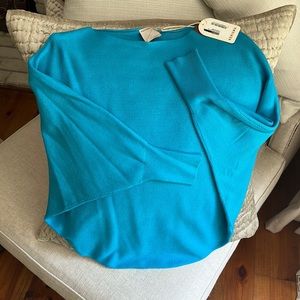 Women’s turquoise Kerisma sweater size S/M.